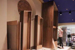 Austin Glidewell working on a large cabinet assembly