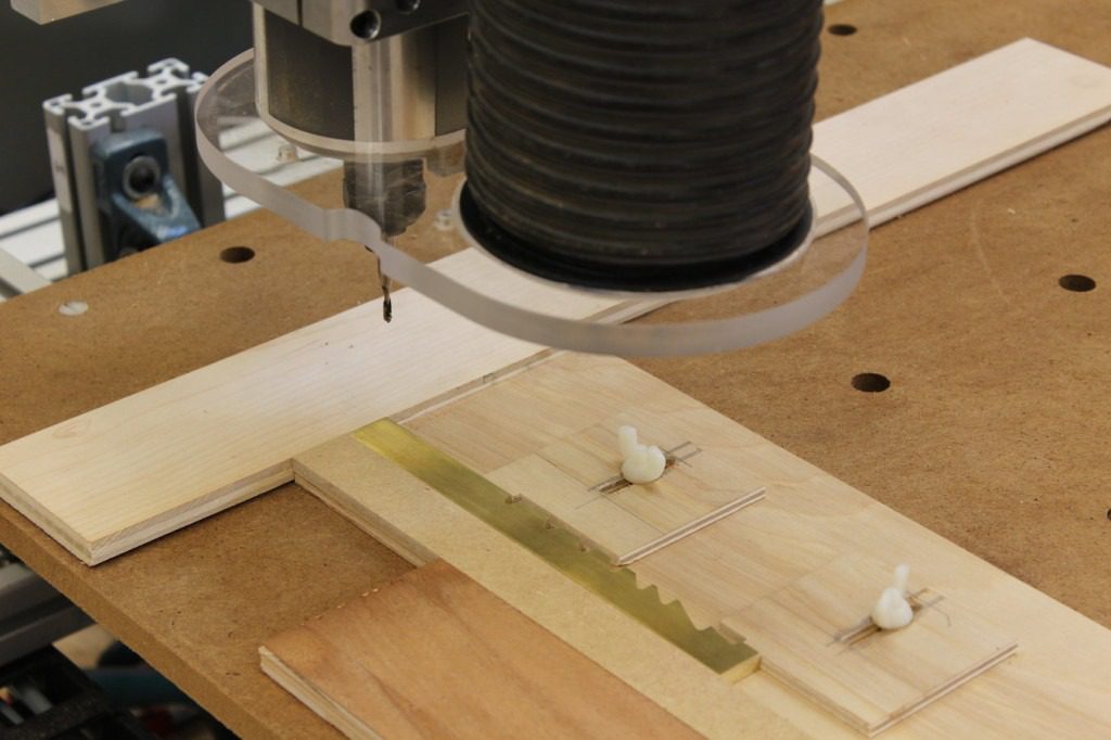 A small piece of brass is shaped