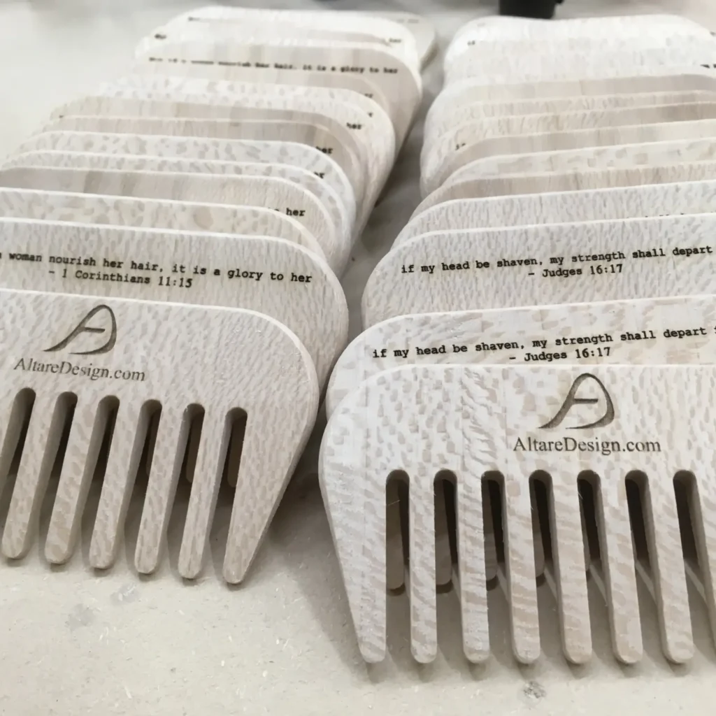 batch of wooden combs with custom engraving