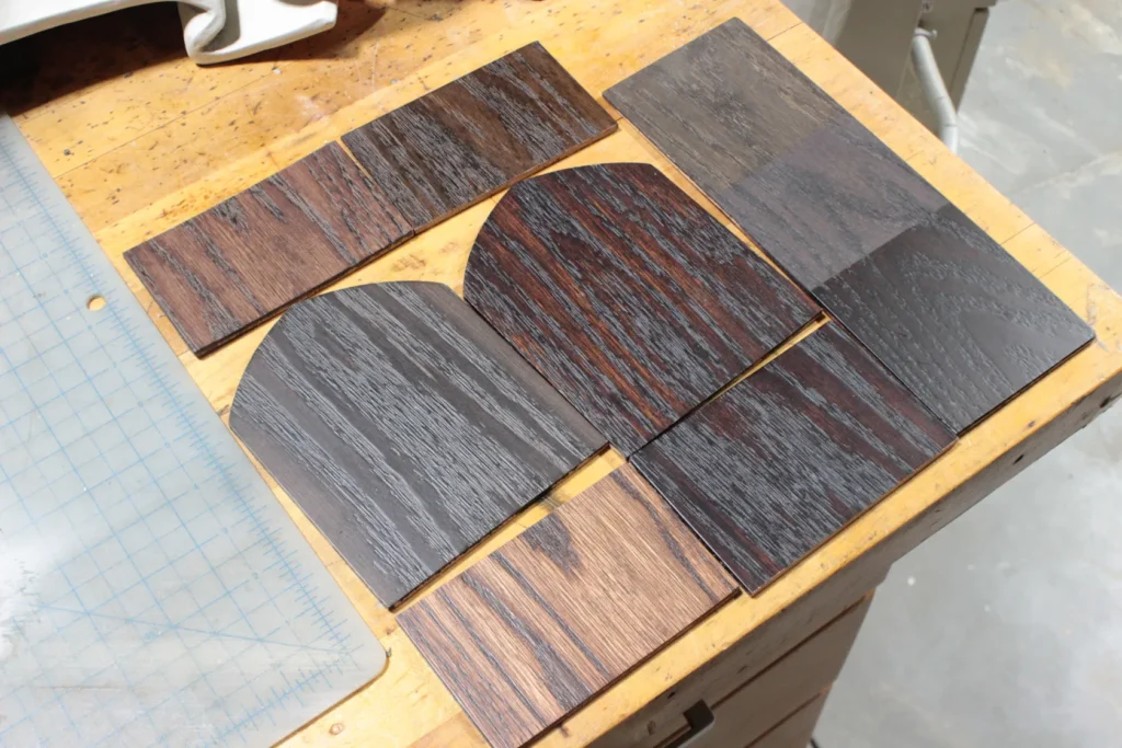 Six red oak stain samples plus a storyboard on the right, showing color matching progress from mismatched tones to the perfect chapel tone